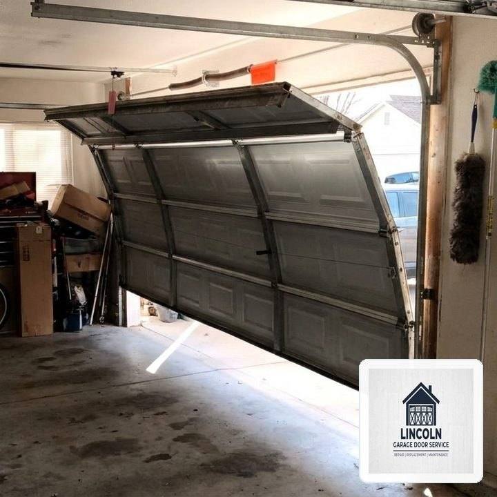 Off-Track Garage Door Emergency Realignment & Laser Calibration in Manor, TX